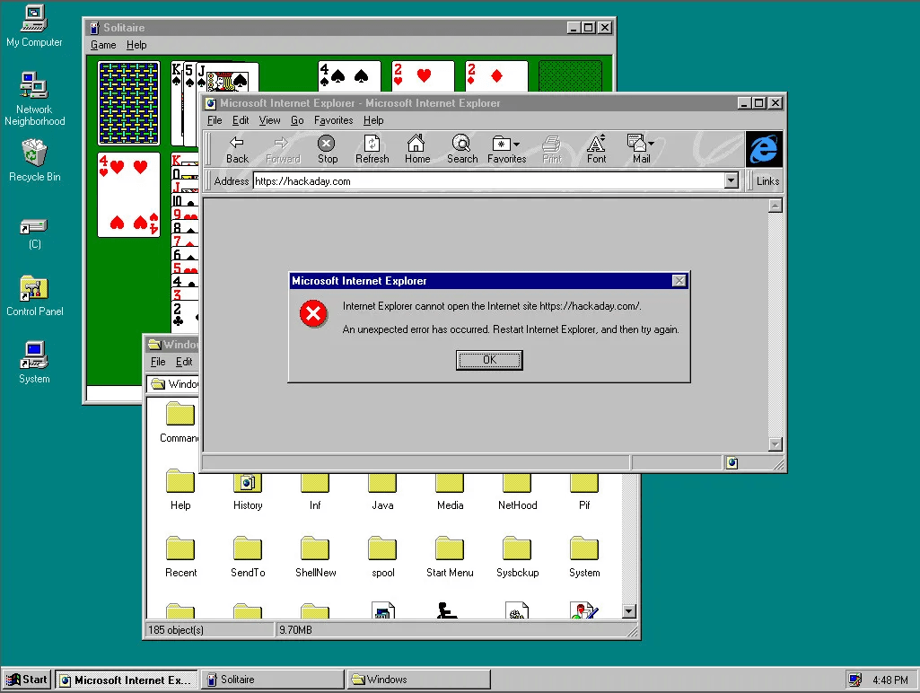 Windows '95 home screen with solitare and a few other windows open